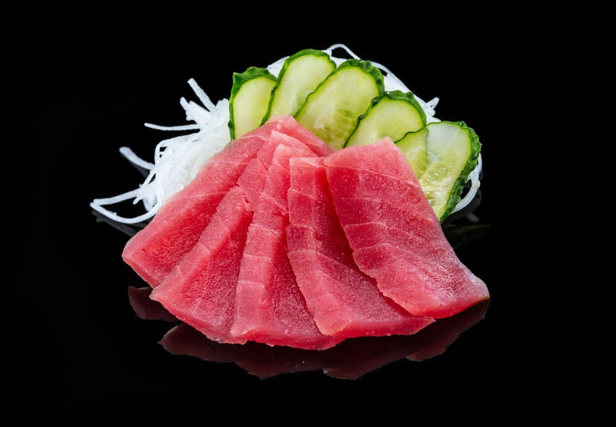 El Arte del Corte de Pescados y Mariscos: Sushi y Sashimi en Sushican